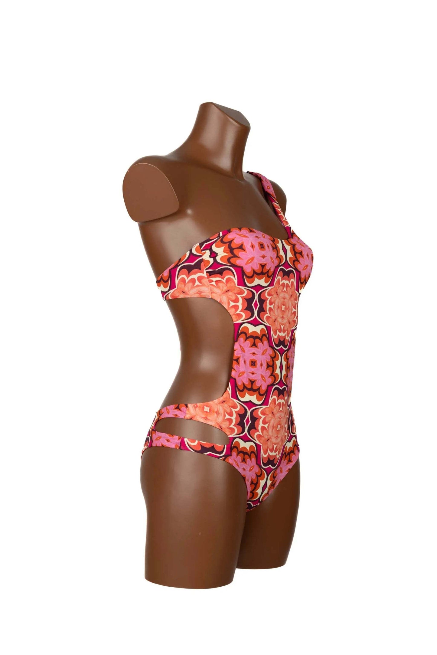 Intero Monospalla monospalla trikini swimsuit with deep back neckline and cut-out sides on mannequin