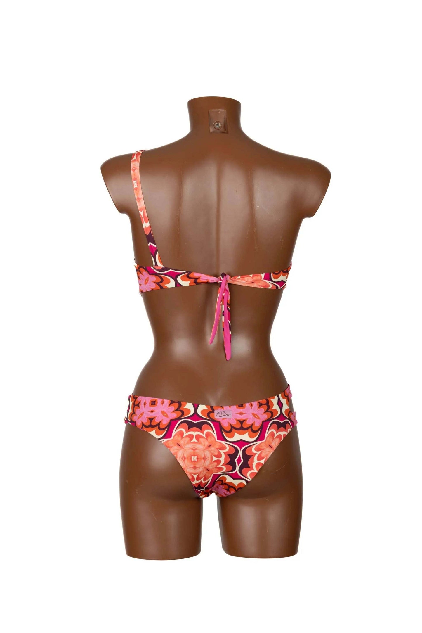 Back view of Intero Monospalla trikini with floral pattern and deep back neckline