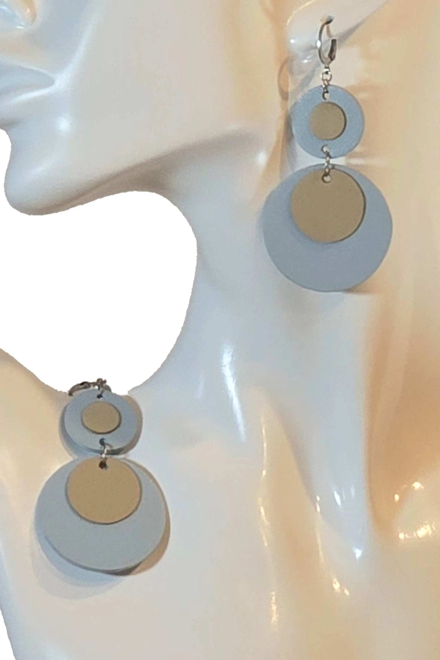 Handmade Orecchini Round Clear Sky earrings in light blue and beige leather with hypoallergenic steel hooks, 5cm long