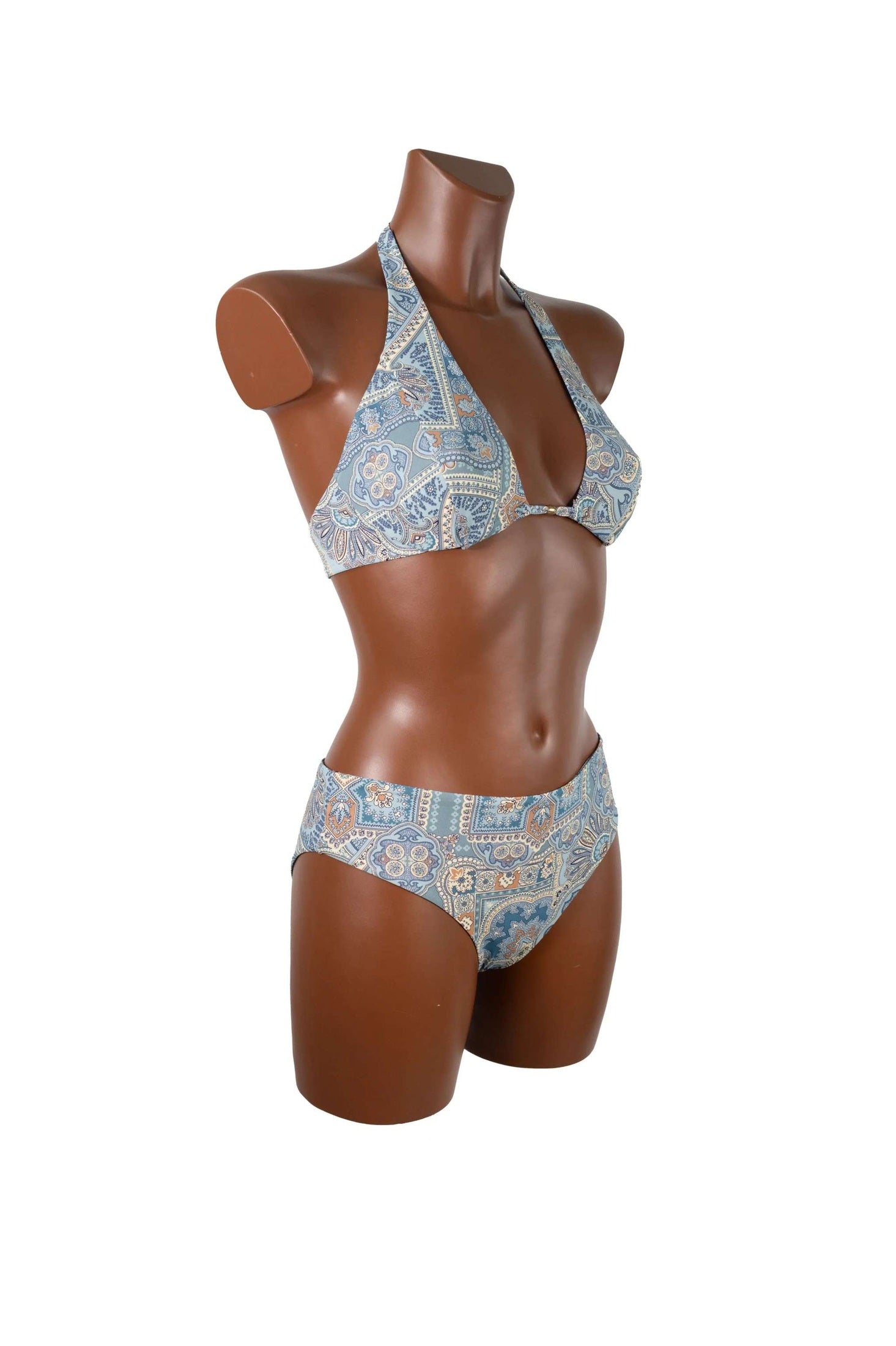 Bikini Vela preformed halter top with comfortable side-height slip in blue patterned fabric made in Italy