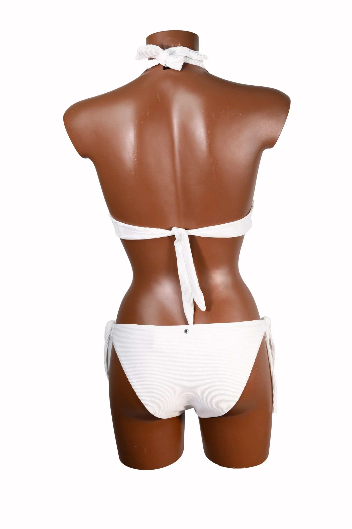 White bikini ferretto with adjustable side ties on mannequin back view